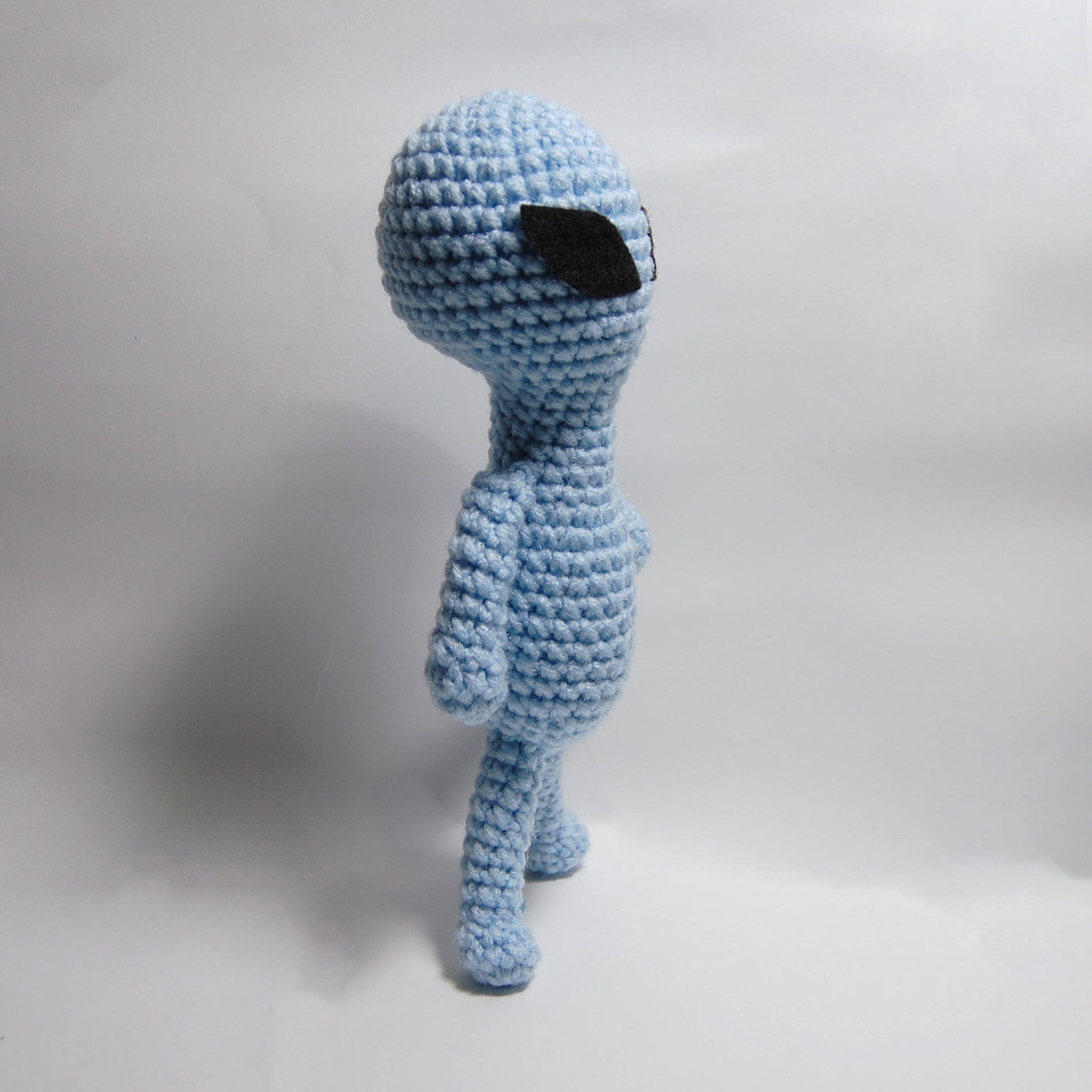 side profile blue alien amigurumi
